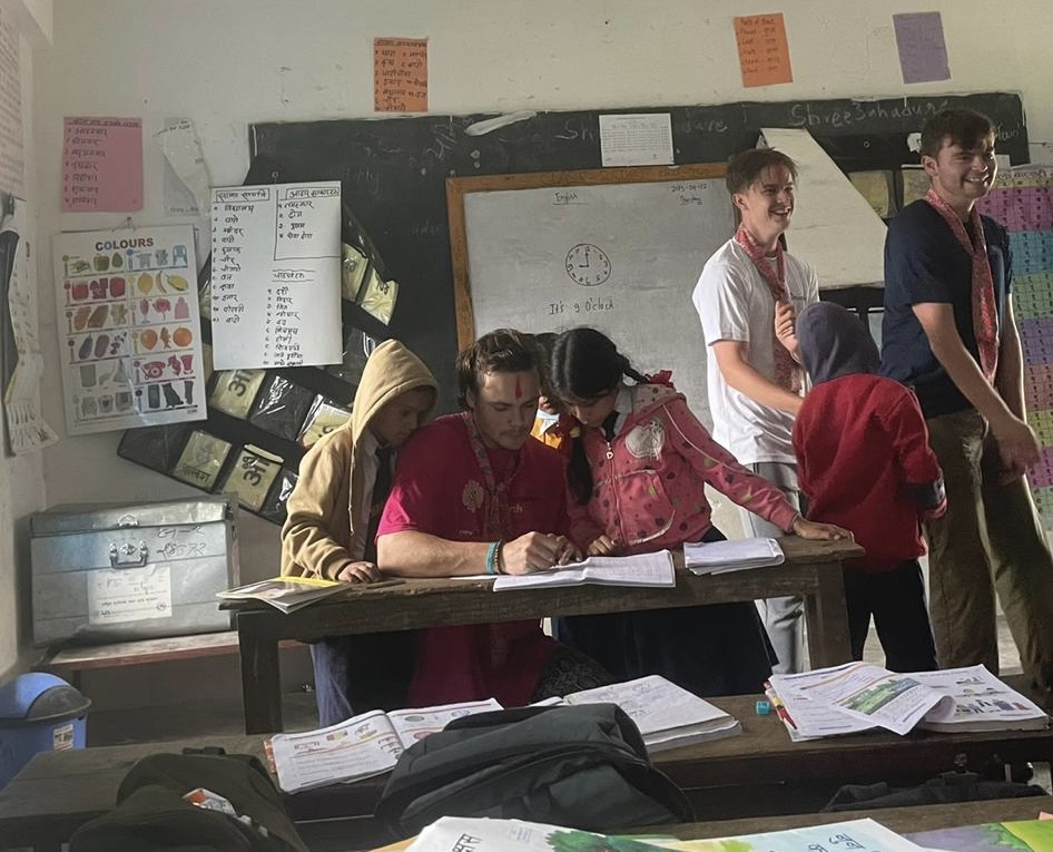 Group photo with local hosts during bindi/flower ceremony